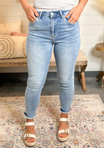 High Rise Frayed Hem Skinny Jeans